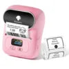 Pink thermal printer with labels on a white background